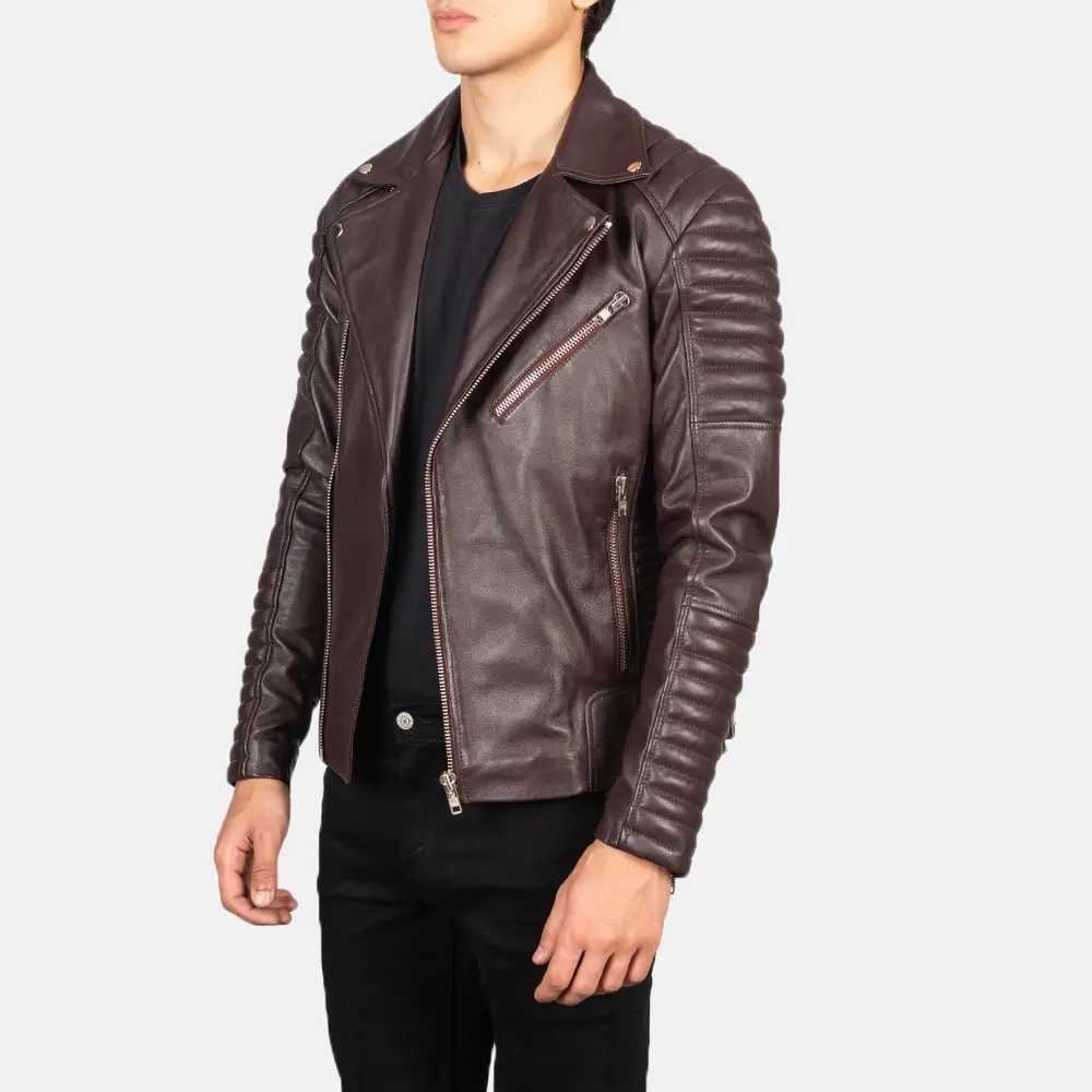 A diverse range of men's leather jackets displayed on a rack.